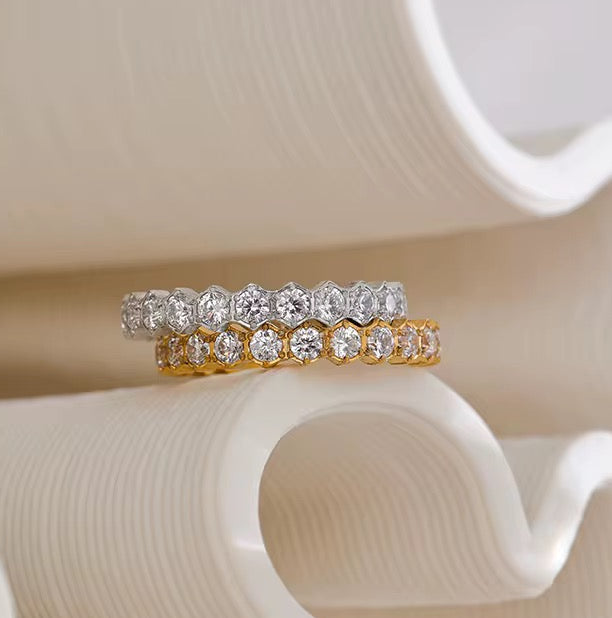 Bague tennis ornée de pierres de zirconium doré et argenté