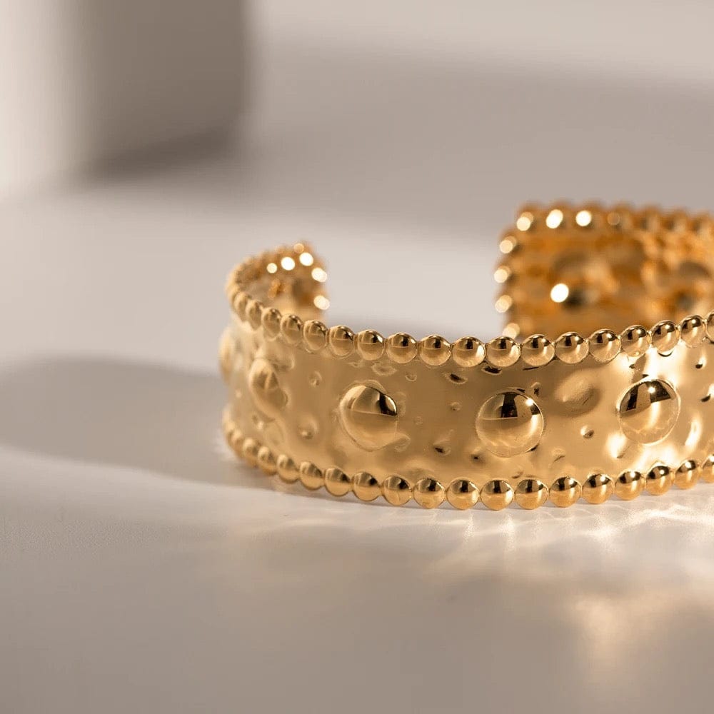 Bracelet jonc doré avec motifs, large et ajustable