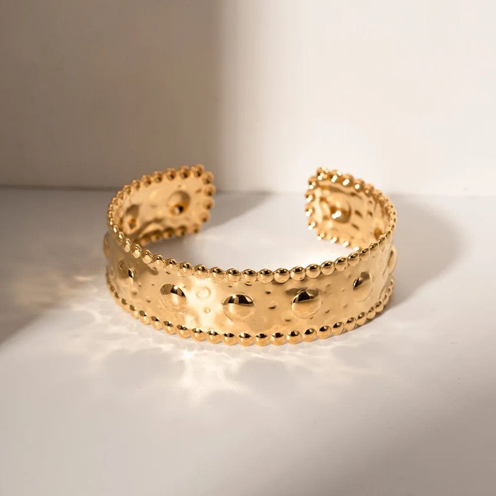Bracelet jonc doré avec motifs, large et ajustable