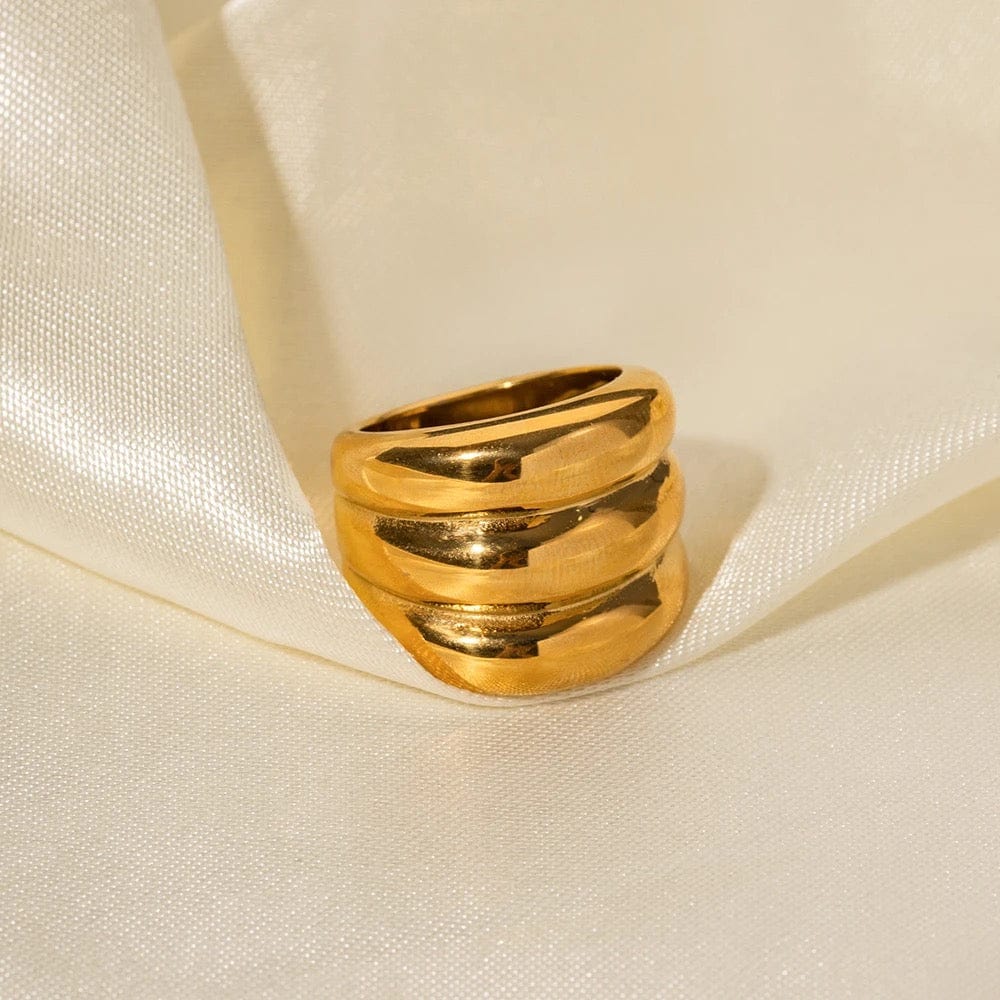 Bague courbée dorée trois anneaux