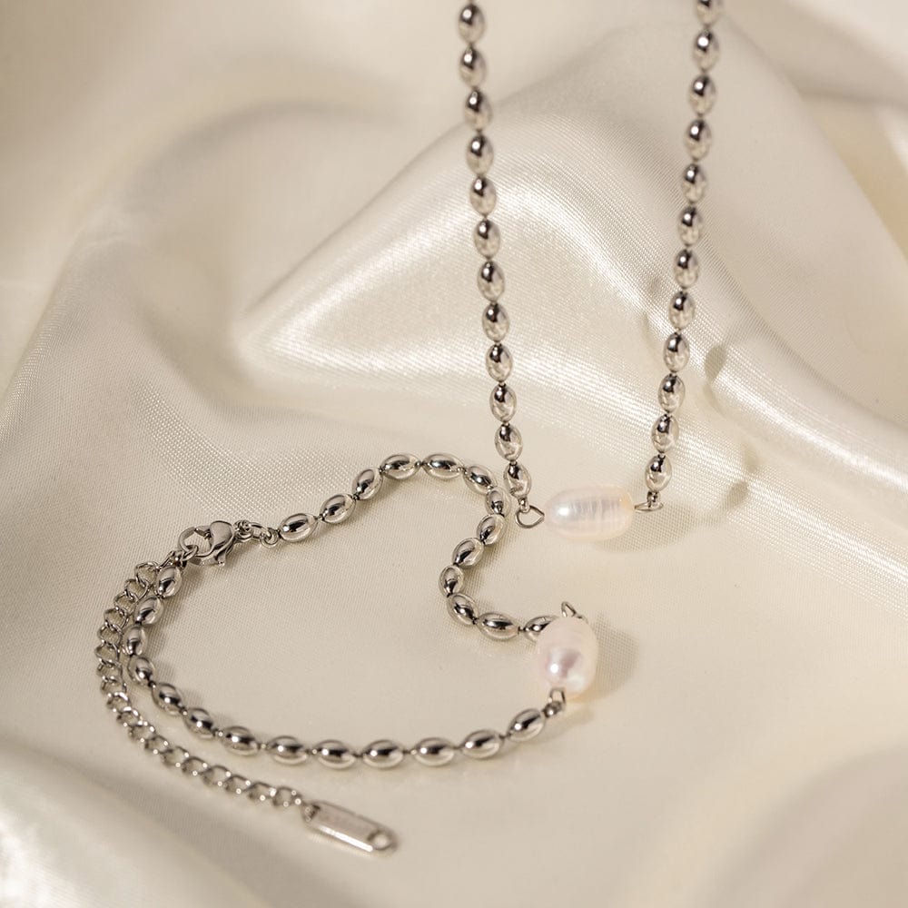 Unique : Collier en acier inoxydable et perle d'eau douce