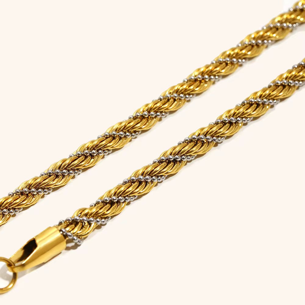 Bracelet torsadé bicolore en acier inoxydable doré à l’or fin
