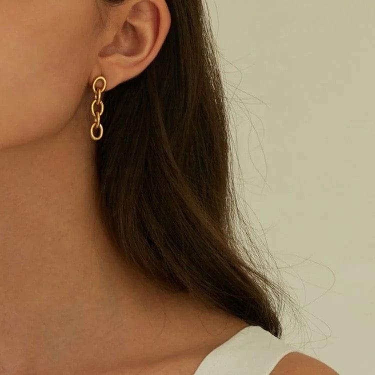 Unis  : Boucles d'oreilles pendantes