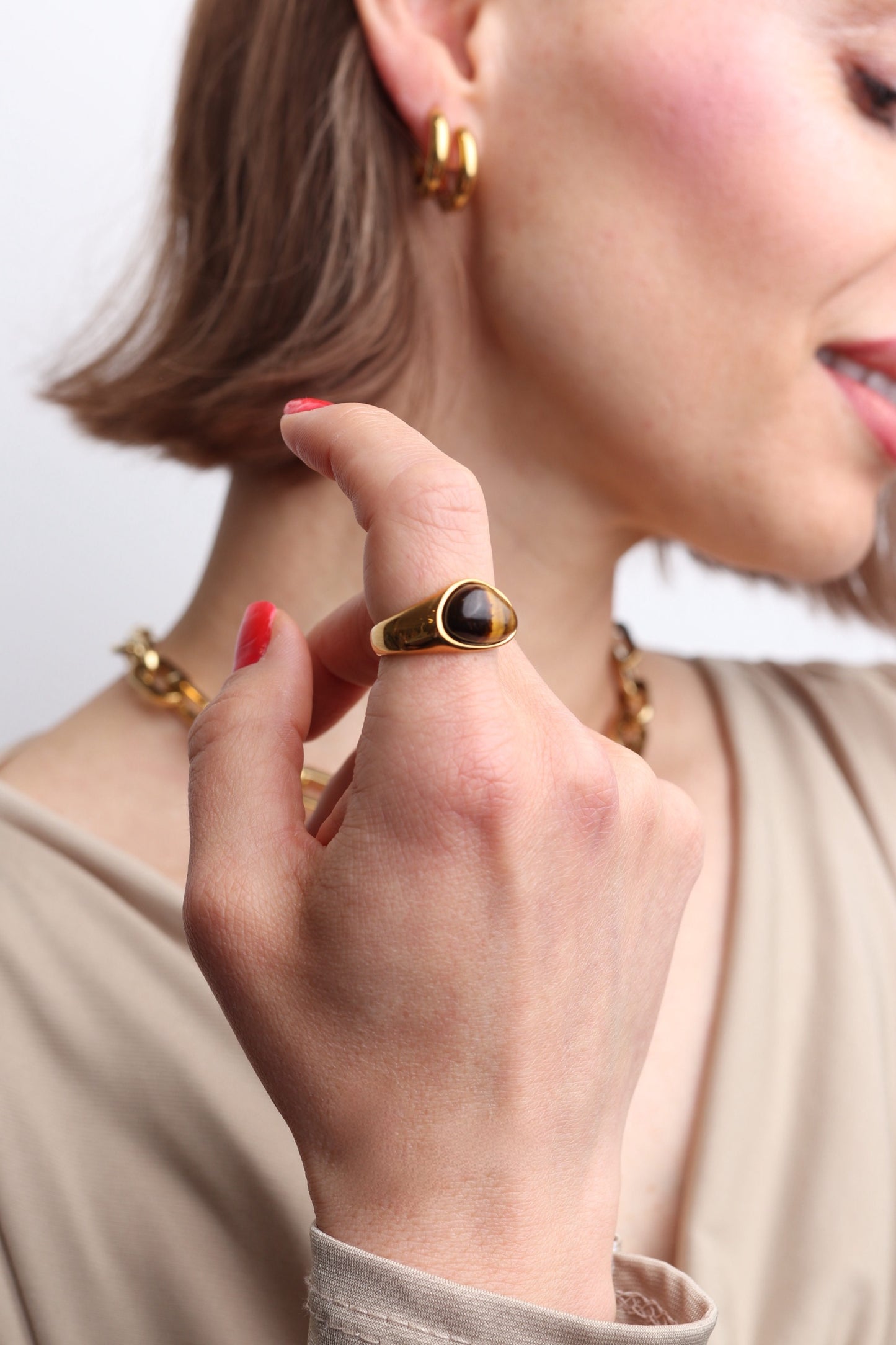 Bague Juliette en acier inoxydable doré – Pierre œil de tigre marron