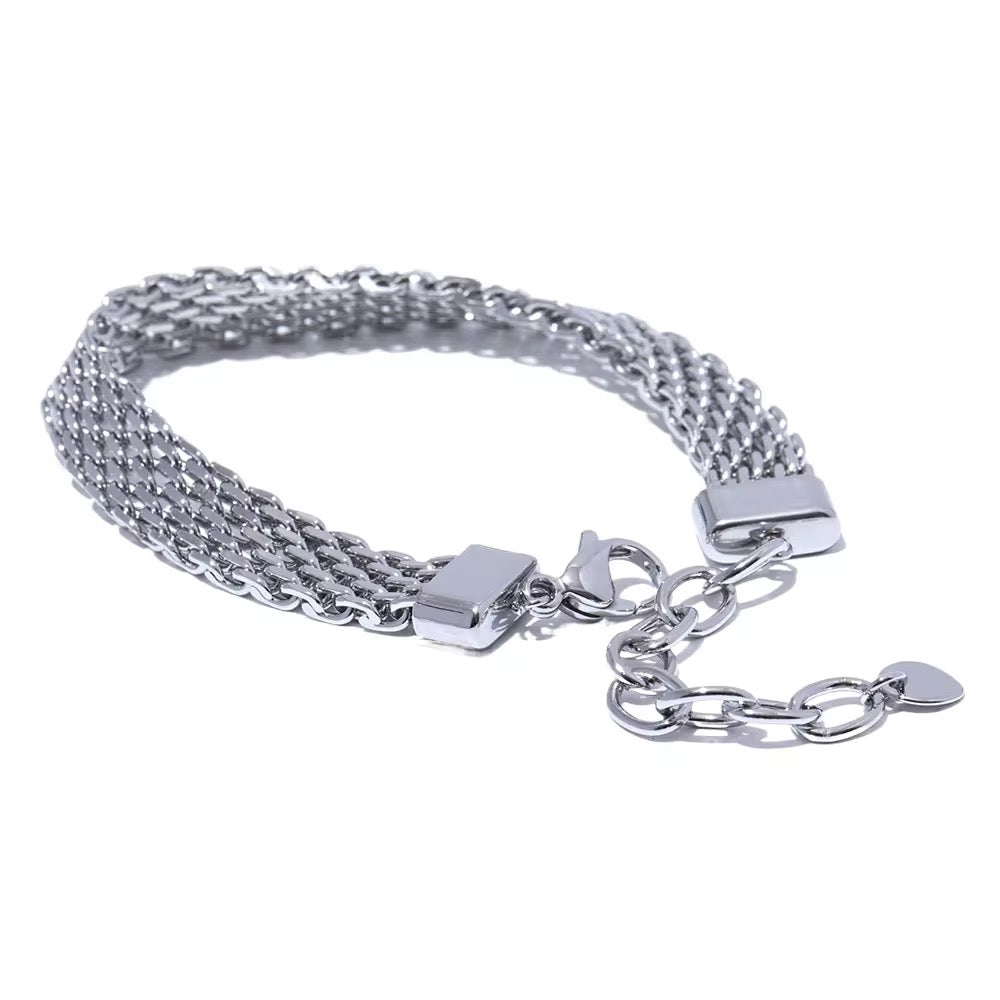 Bracelet Ashley : Chaîne plate facettée en acier chirurgical – Doré ou argenté L'or Didon