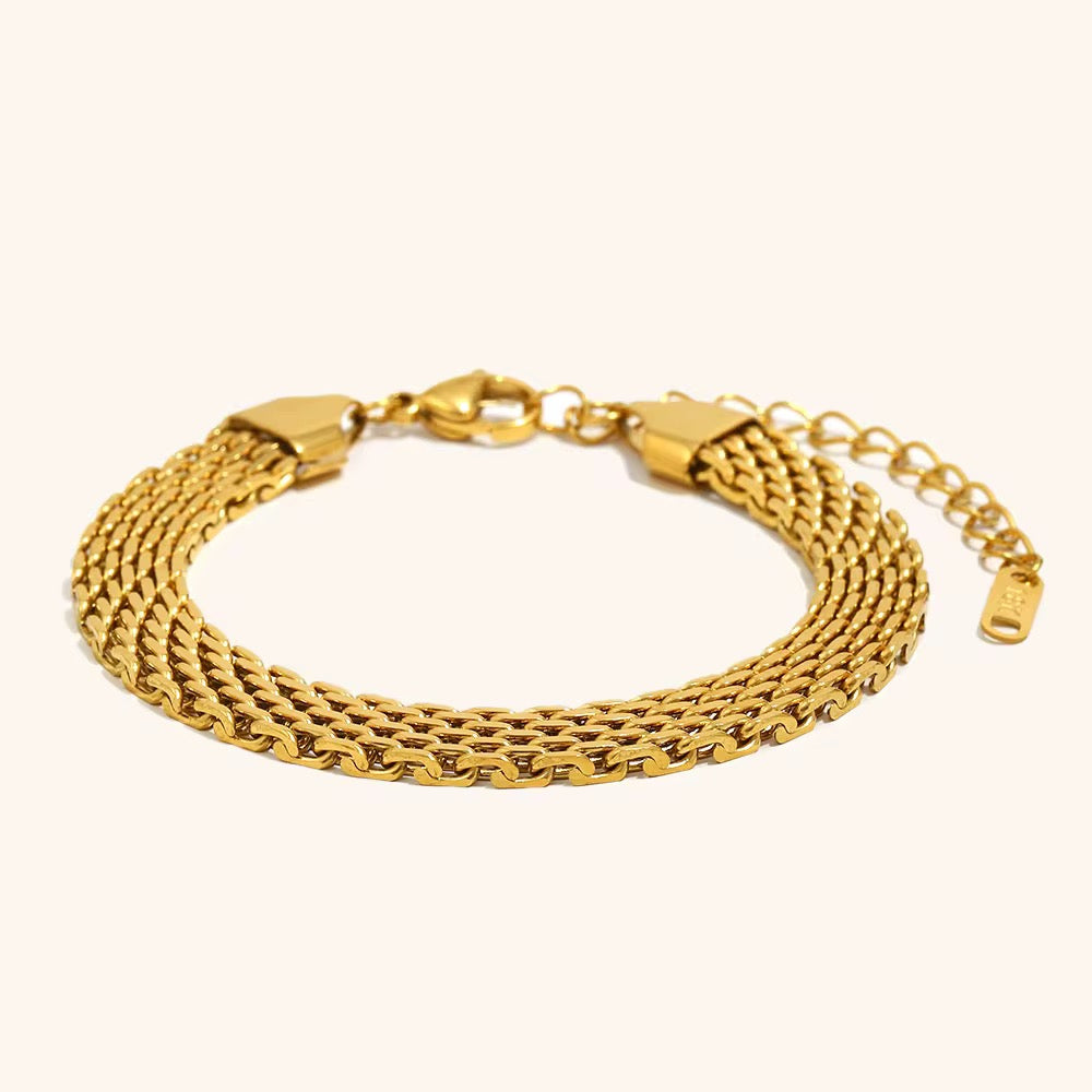 Bracelet Ashley : Chaîne plate facettée en acier chirurgical – Doré ou argenté L'or Didon