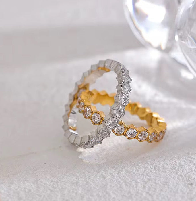 Bague tennis ornée de pierres de zirconium doré et argenté