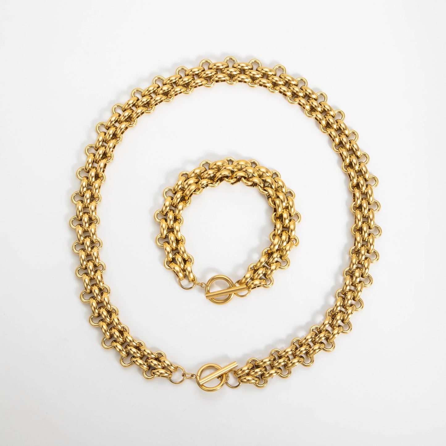 Bracelet et collier maille épaisse dorés assortis